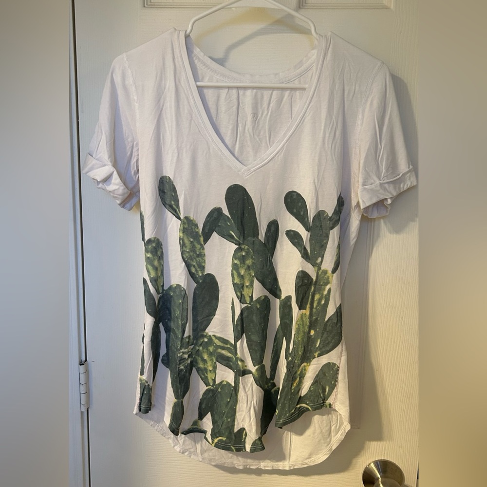 Lululemon shirt, size 6, color green and white